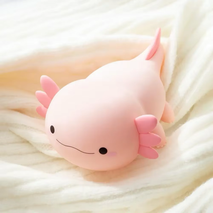  Adorable axolotl night light duo in a soft pink tone, perfect for adding warmth to any space. Available at BlissfulGlow