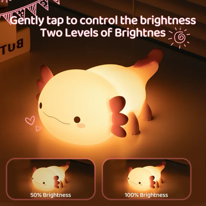 Softly glowing axolotl night light with adjustable brightness levels, perfect for creating a calming ambiance. Available at BlissfulGlow