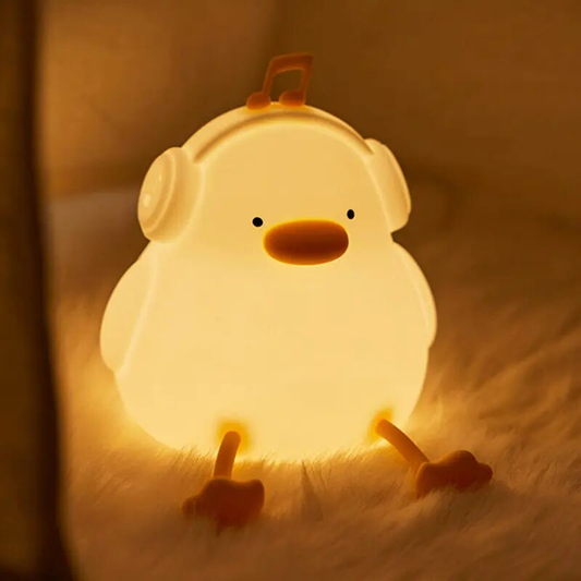 Duck-shaped night light with a soft warm glow, perfect for cozy and relaxing nights, available at BlissfulGlow.