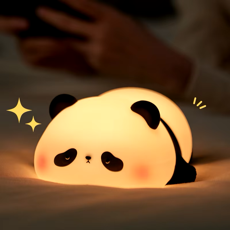 Cuddly panda night light, great for creating a cozy and comforting environment as a bedside lamp. Available at BlissfulGlow.