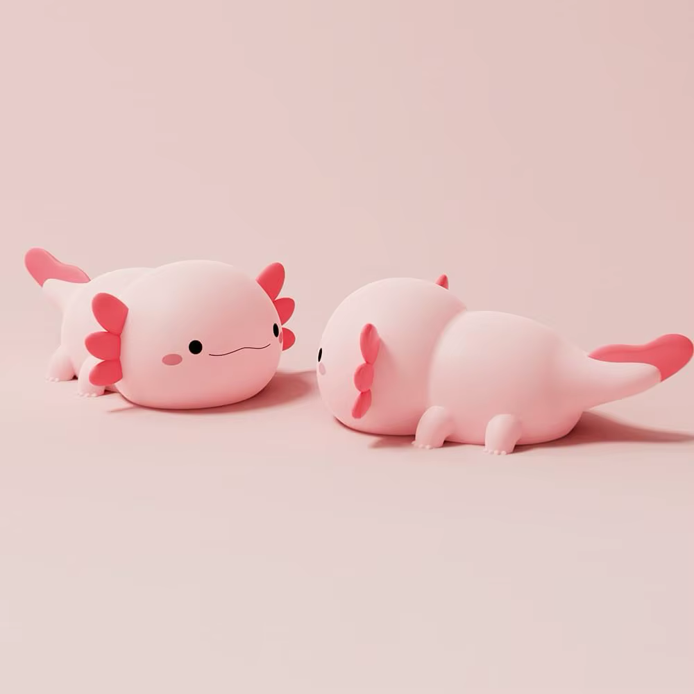  Charming pink axolotl night light, a delightful decorative piece for children’s rooms. Available at BlissfulGlow