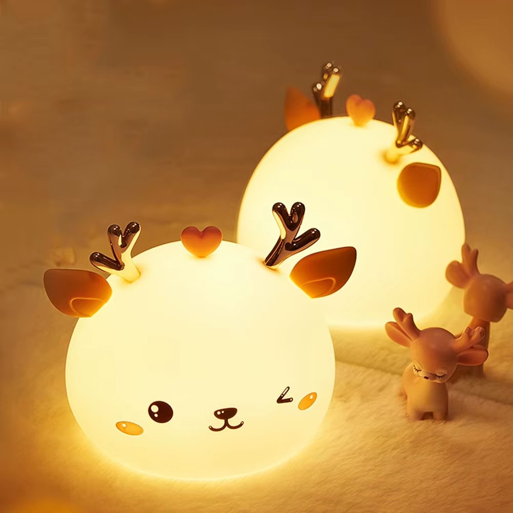 Set of two reindeer-shaped night lights with a soft glow, featuring adorable designs to create a cozy and festive atmosphere, available at BlissfulGlow.