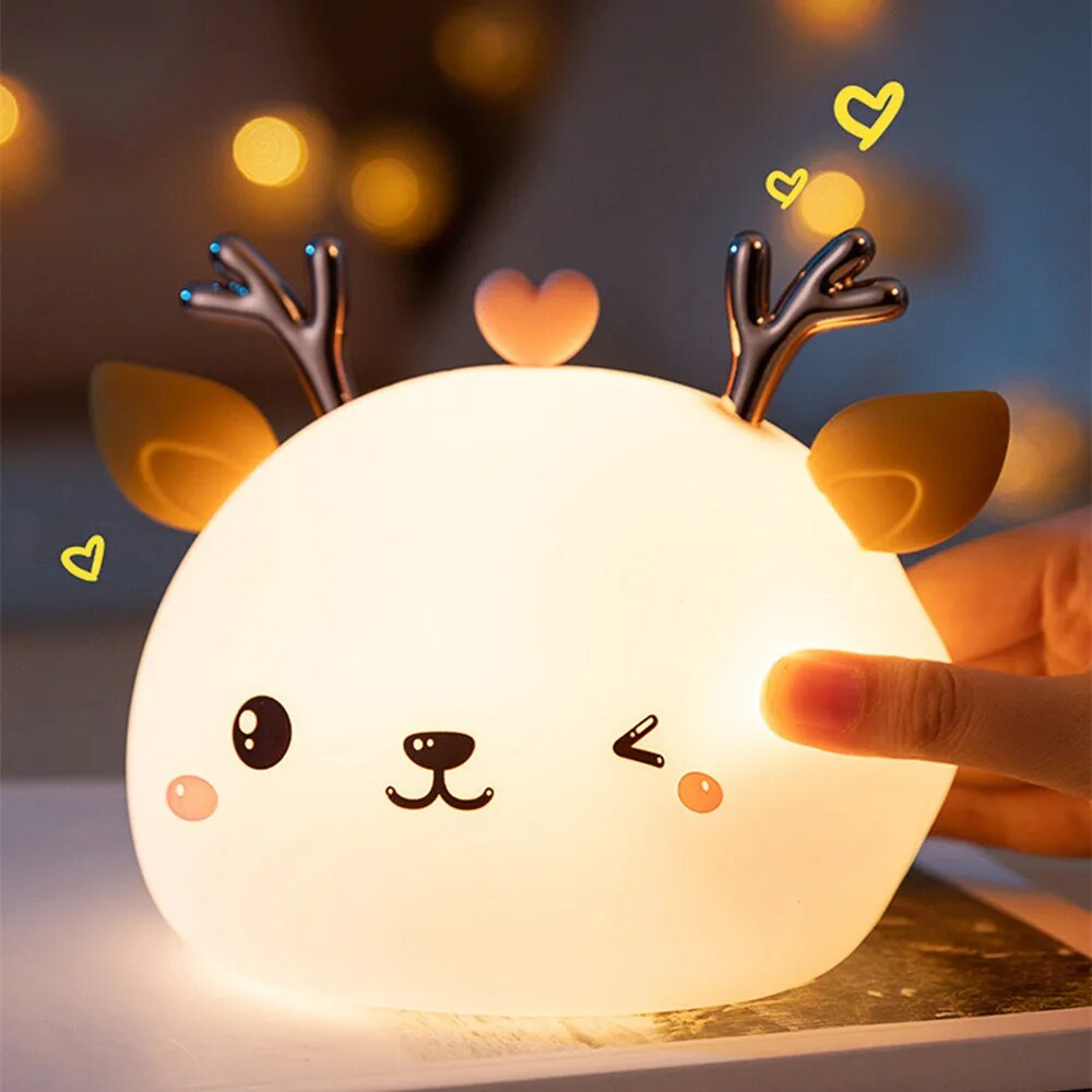 Reindeer-shaped night light with a soft glow and adorable design, perfect for creating a warm and festive ambiance, available at BlissfulGlow.