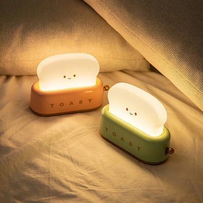 Adorable toast night lights in pink and green variants, perfect for adding charm to any space, at BlissfulGlow.