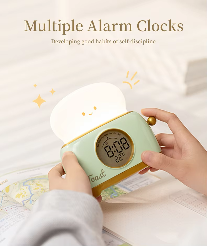 Toaster-shaped alarm clock with multiple alarm settings, promoting self-disciline and good habits, combined with a cozy night light. Available at BlissfulGlow.